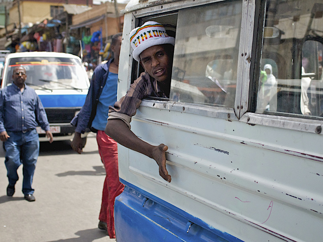 Taxi bus in Addis Ababa, Ethiopia. Photo by Overseas Development Institute/Flickr. 