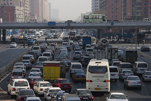 Beijing to Restrict Vehicles on Road During Games. Image description