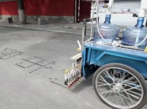 Friday Fun: Water Calligraphy on a Tricycle