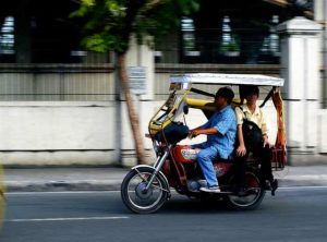 Tricycles are a source of air pollution and health hazards in Manila. Photo by digitalpimp.