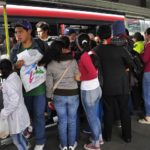 A crowd of passengers boards the TransMilenio BRT in Bogotá, Colombia. Photo by Mariana Gil/EMBARQ Brazil.