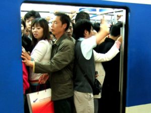 Crowded subway car in Beijing, China. Photo by Filipe Fortes/Flickr.