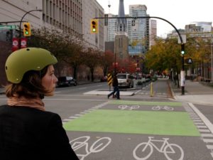 Separated bike lane in Vanouver, Canada. Photo by Paul Krueger/Flickr. Cropped.