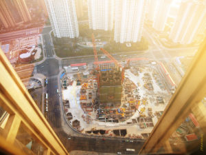 The construction of the Shanghai Tower is a testament to architectural skill and China's growing economic power, but does this come at the expense of vibrant street life? Photo by Jerry Yang/Flickr.