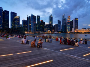 A crowd gathers overlooking Singapore's Marina Bay. Photo by Nicolas Lannuzel/Flickr.