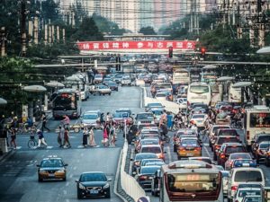 Although congestion pricing is often a contentious issue, its ability to decrease congestion and air pollution while increasing revenue for sustainable transport projects makes it a policy many cities find worth pursuing. Photo by Zhou Ding/Flickr.