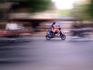 As the two-wheeler sector continues to expand in India, researchers study the demographics of two-wheeler users and their possible role in promoting sustainable mobility. Photo by Meghana Kularni/Flickr."