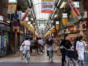 Japan's shotengais - partly enclosed markets - succeed both because of their proximity to transport and the unique, tightly knit communities they foster. Photo by Michael Vito/Flickr.