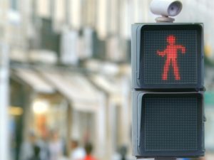 A new way to encourage pedestrians not to cross in the face of oncoming traffic: entertain them. Photo via smart/Youtube.