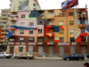 Tirana, Albania painted buildings throughout the city with bright designs to increase residents' sense of belonging and hope for the city's future. Photo by Joonas Lyytinen.