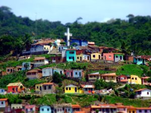 A Brazilian slum, or favela, and a cross. Pope Francis's Encyclium addresses urban poverty and inequality as well as climate change. Chico Ferreira/Flickr