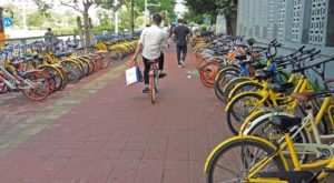 Chinese Cities Aim to Rein in Bike-Sharing Boom